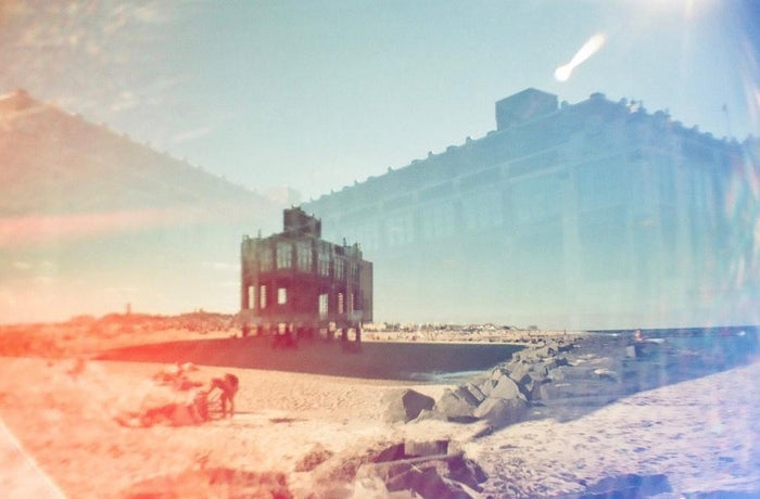 Double exposure of the beach at Asbury Park.